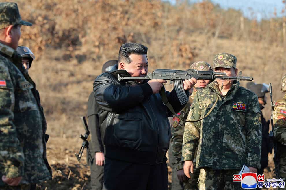In this photo provided by the North Korean government, Kim Jong Un visits a western operational training base (Korean Central News Agency/Korea News Service/AP)