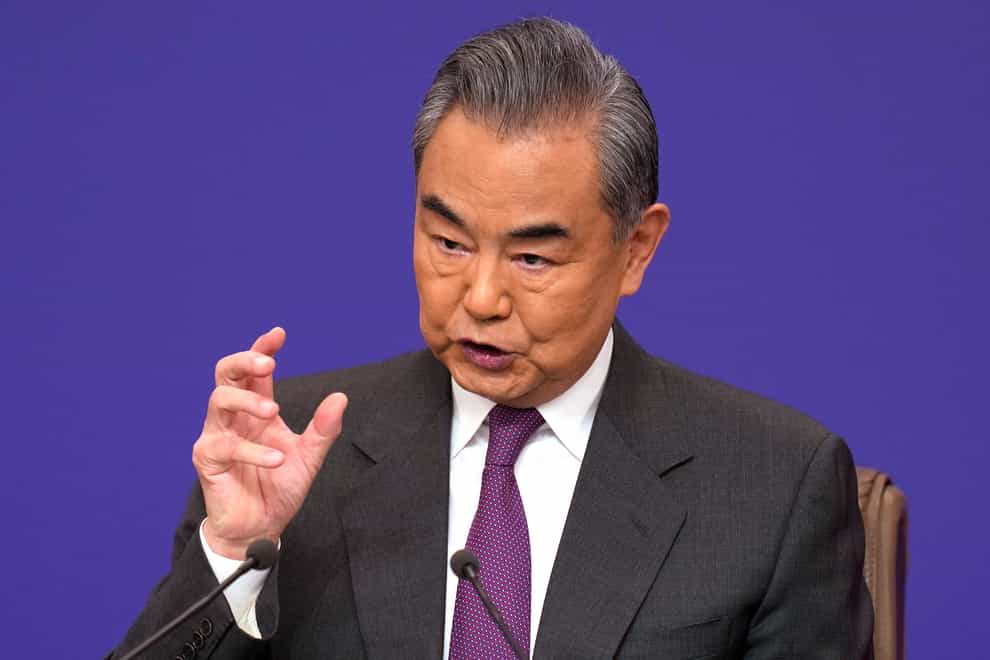 Chinese foreign minister Wang Yi (Ng Han Guan/AP)