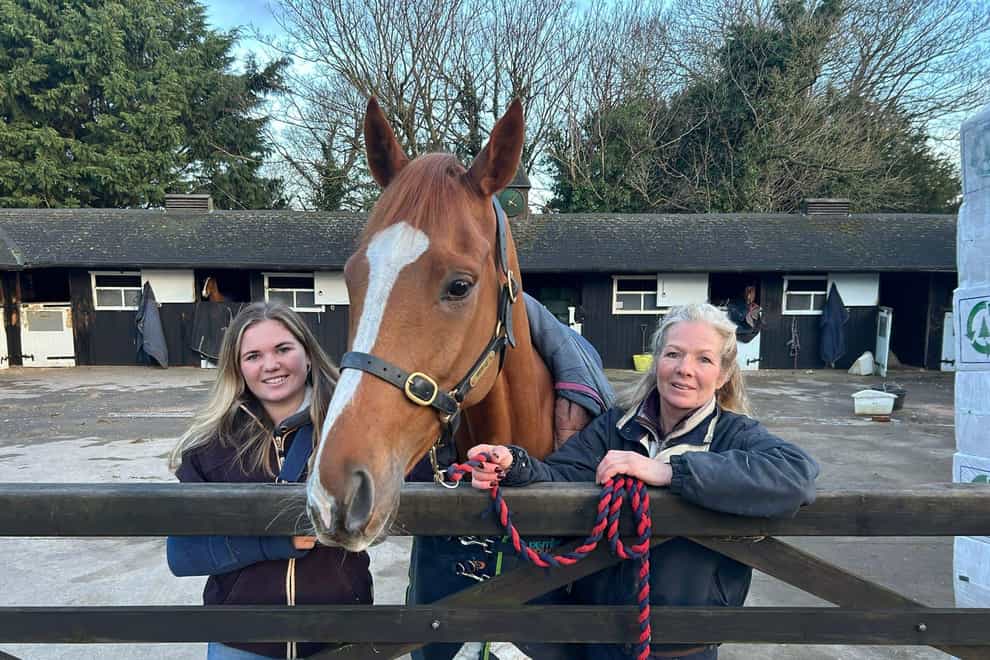 Mother and daughter Olive and Georgie Nicholls with race horse Thank You Ma’am. Rupert Adams/PA