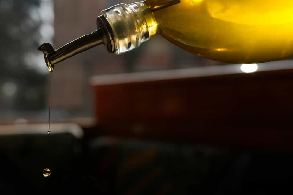 Italians have reduced their consumption of olive oil, a survey has suggested (AP Photo/Antonio Calanni)