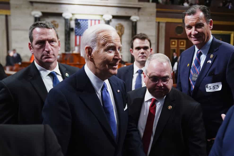 President Joe Biden, second left, departs after delivering the State of the Union address (Shawn Thew/AP)