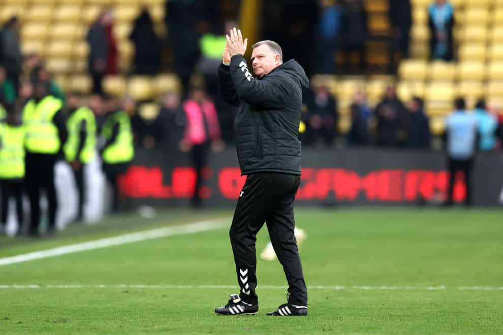 Coventry manager Mark Robins celebrates victory over Watford (Kieran Cleeves/PA).