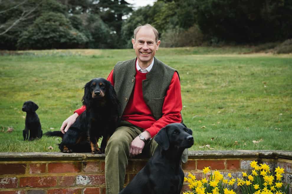 The Duke of Edinburgh with his dogs Teal (Labrador), Mole (cocker spaniel), and Teasel (Labrador puppy) at Bagshot Park earlier this month (Chris Jelf/Buckingham Palace/PA)