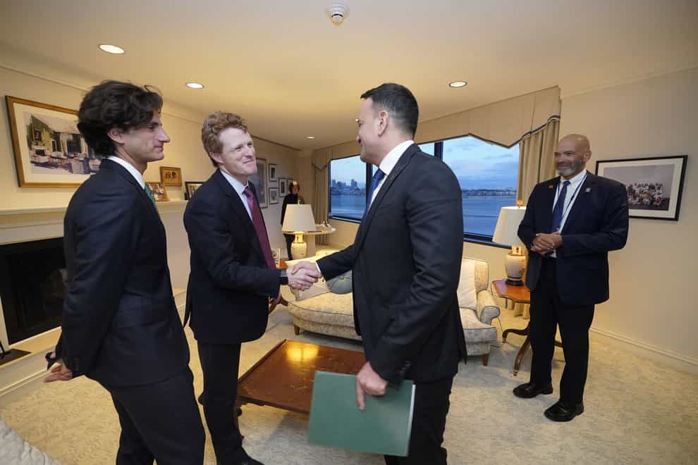 Taoiseach Leo Varadkar (centre) is greeted by Joe Kennedy III (second left) and Jack Schlossberg, the only grandson of John F. Kennedy (Niall Carson/PA)