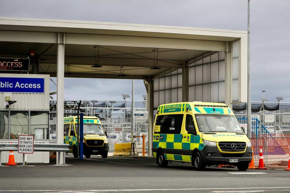 Ambulances leave Auckland International on March 11 after more than 20 people were injured during what officials described as a ‘technical event’ on a Chilean plane traveling from Sydney, Australia to Auckland. (Dean Purcell/AP)