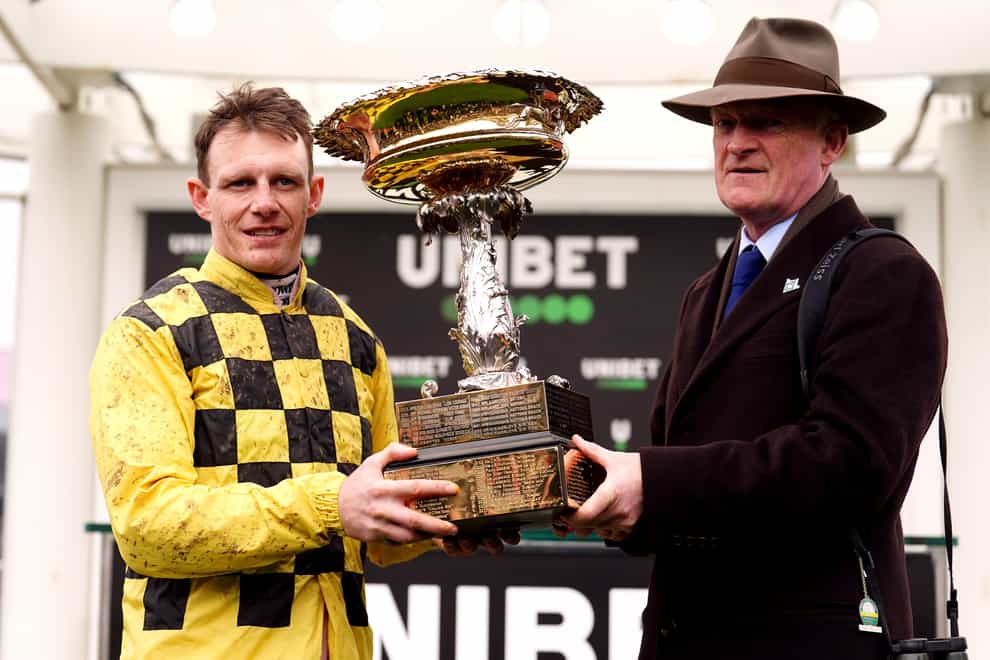 Jockey Paul Townend and trainer Willie Mullins with the Champion Hurdle trophy (David Davies for the Jockey Club)