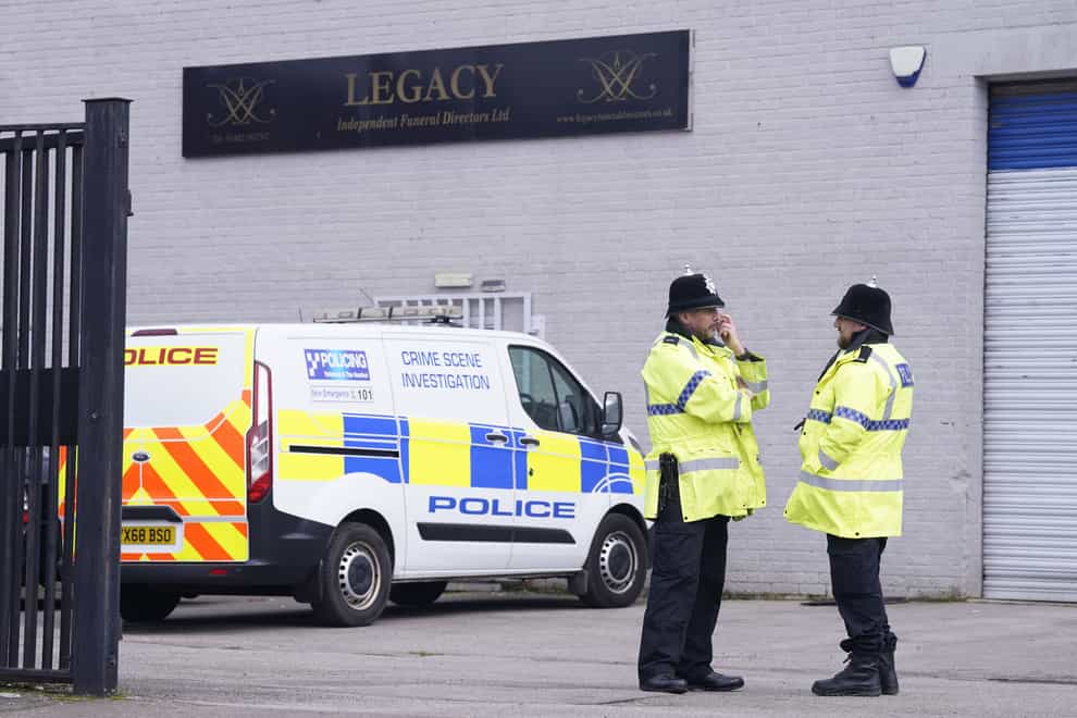 Police outside the Hessle Road branch of Legacy Independent Funeral Directors in Hull (Danny Lawson/PA)