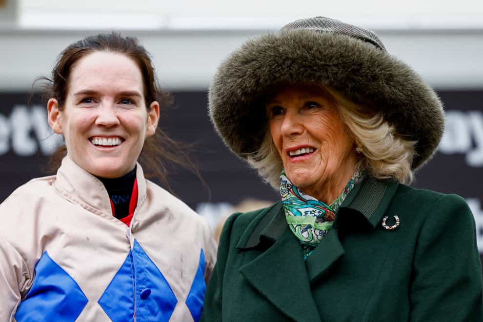 Queen Camilla (right) with Rachael Blackmore, rider of Captain Guinness and winner of the 15:30 Betway Queen Mother Champion Chase (Pete Cziborra/PA)