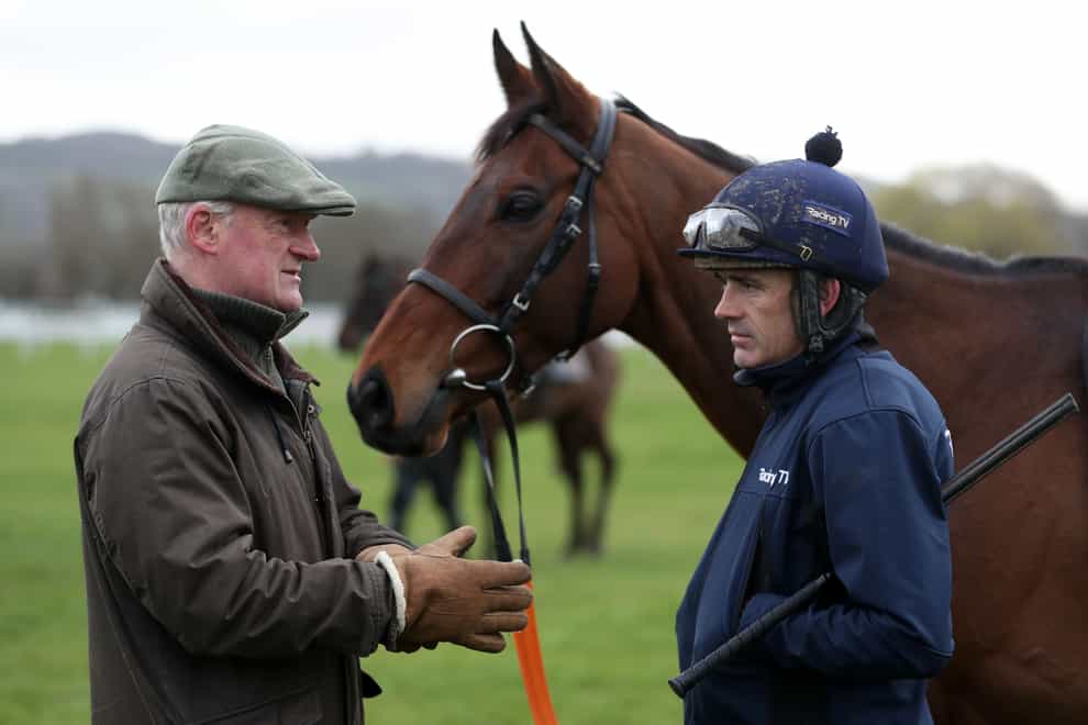 Trainer Willie Mullins and Ruby Walsh in conversation on the Cheltenham gallops (Andrew Matthews/PA)