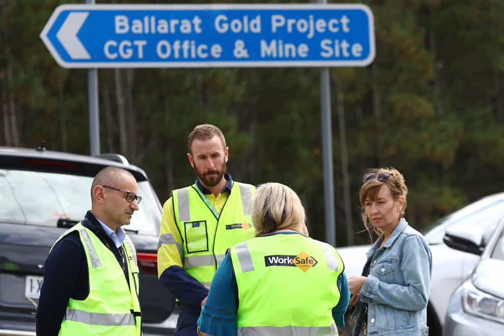 Worksafe Victoria representatives arrive for a press conference near Ballarat, Australia after falling rocks inside a gold mine killed one worker and left another with life-threatening injuries (Con Chronis/AAP Image/AP)