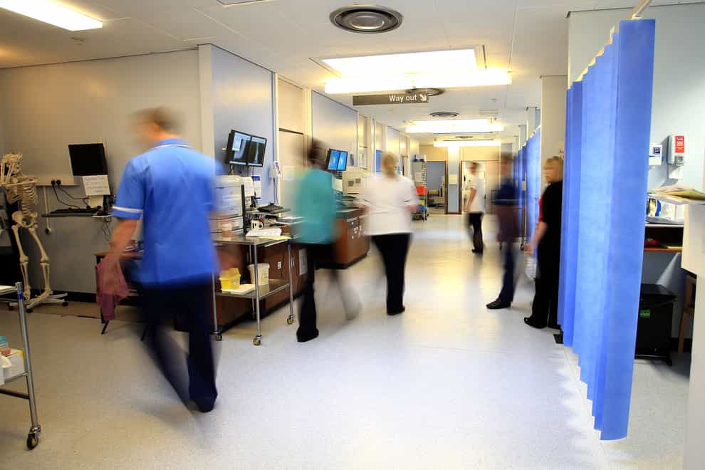 Long waits for hospital treatment are continuing to rise, though the size of the total waiting list has fallen (Peter Byrne/PA)
