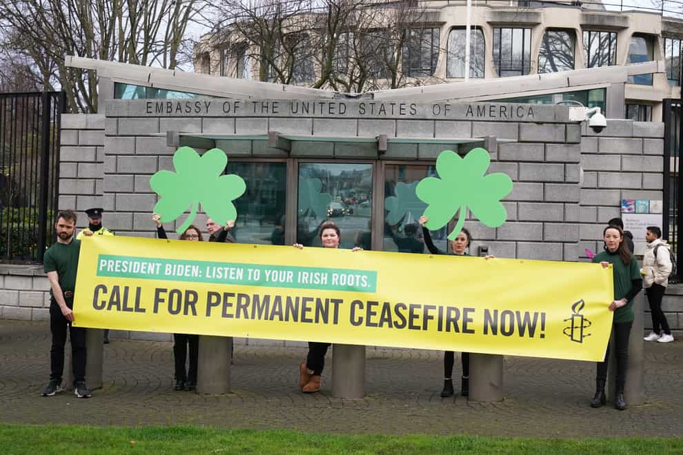 Amnesty International Ireland activists demonstrate outside the US Embassy in Dublin urging President Joe Biden to call for a permanent ceasefire in Gaza. Picture date: Friday March 15, 2024.