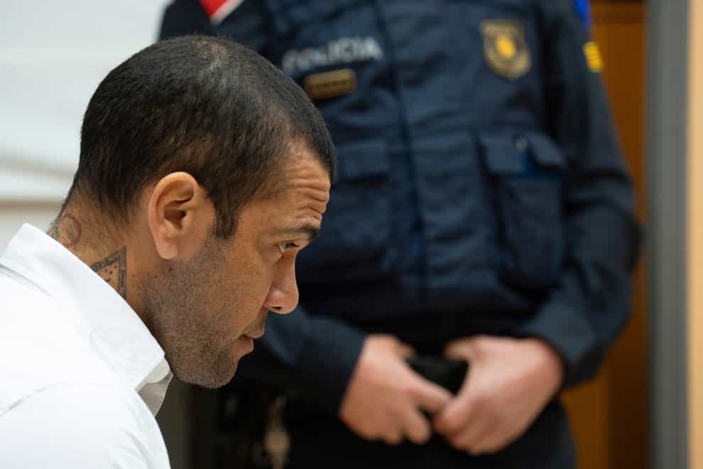 Brazilian footballer Dani Alves sits during his trial in Barcelona, Spain on February 5 2024 (D.Zorrakino/AP)