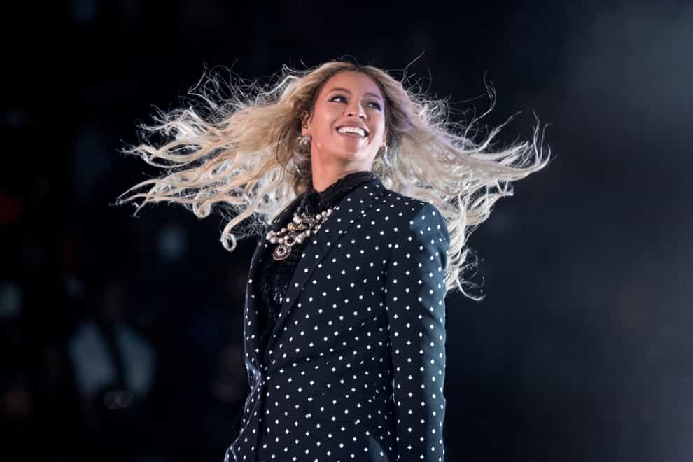 Beyonce recently became the first black woman to top Billboard’s country music chart (Andrew Harnik/AP)