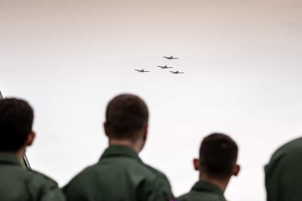 Ukrainian fast jet pilots watching a flypast at their graduation ceremony (Andrew Wheeler/UK MOD Crown copyright)