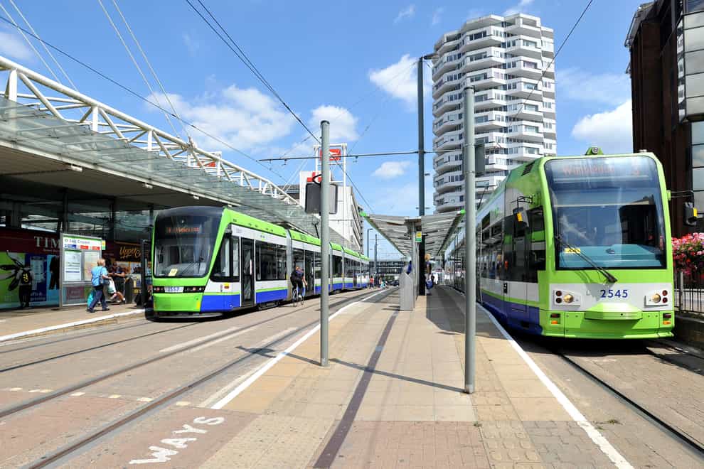 Tramlink trams stop at East Croydon station in Surrey. Members of Unite union on London Trams are set to strike (Nick Ansell/PA)