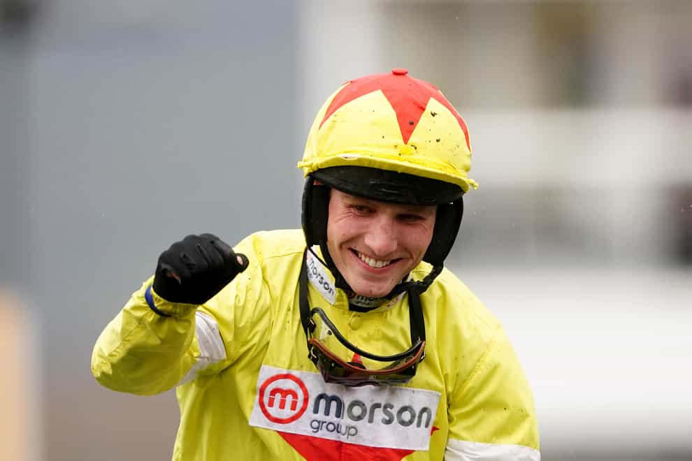Jockey Harry Cobden celebrates onboard Monmiral after winning the Pertemps Network Final Handicap Hurdle on day three of the 2024 Cheltenham Festival (David Davies/PA)