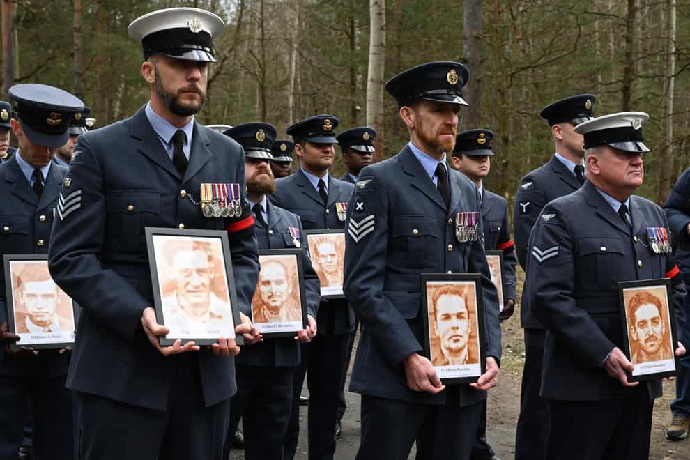 British soldiers pay tribute to Allied prisoners of war who tunnelled out of a German POW camp (Jan Mazur/AP)