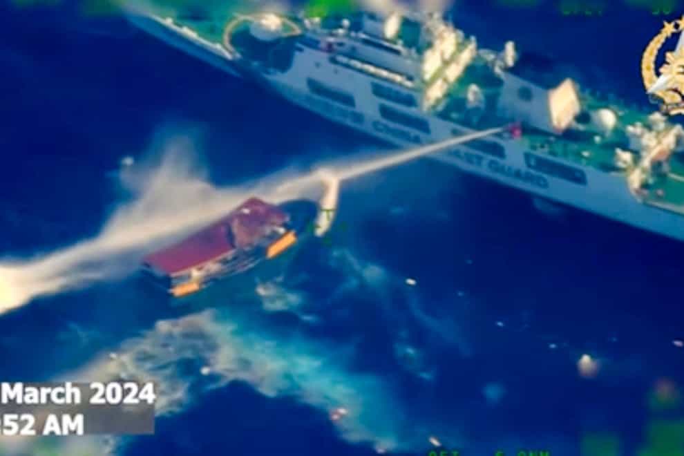 The Philippines has expressed its ‘strongest protest’ with Beijing after a Chinese coast guard ship used water cannons on a Philippine resupply vessel (Armed Forces of the Philippines via AP)