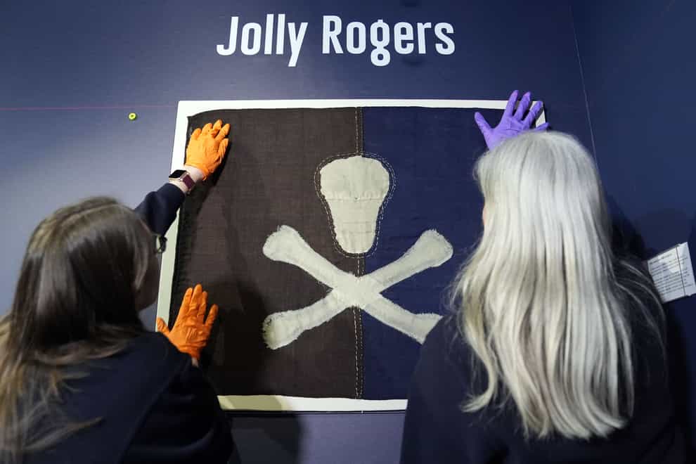 The earliest known surviving example of a Royal Navy submarine Jolly Roger, flown from HMS E54 during the First World War, is installed as part of a Jolly Roger display at the Royal Navy Submarine Museum in Gosport, Hampshire (Andrew Matthews/PA)