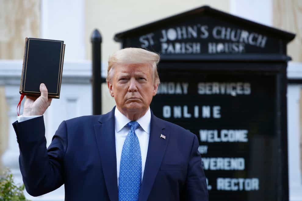 Former president Donald Trump holds a Bible (Patrick Semansky/AP)