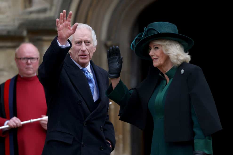 Charles waved to a well-wisher as he and Camilla arrived at St George’s Chapel (Hollie Adams/A)
