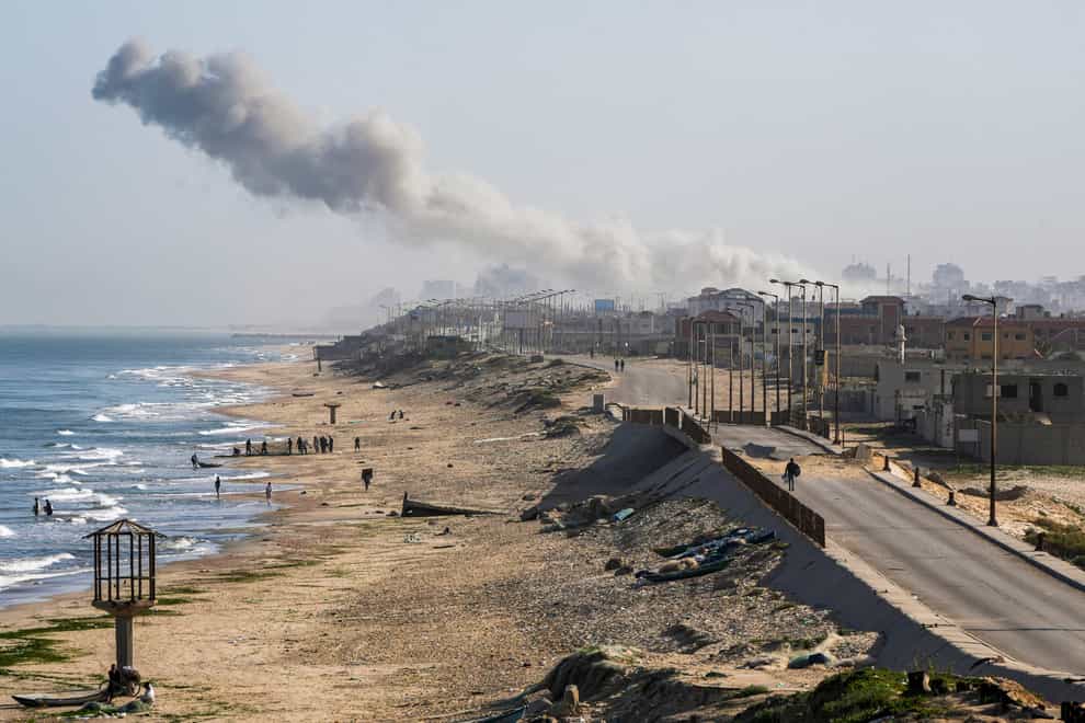 Smoke rises following an Israeli airstrike in the central Gaza Strip (Abdel Kareem Hana/AP)