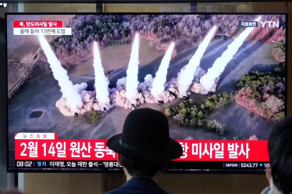 A news programme airs a file image of a missile launch by North Korea at the Seoul Railway Station in Seoul, South Korea, on Tuesday, April 2, 2024 (Ahn Young-joon/AP)