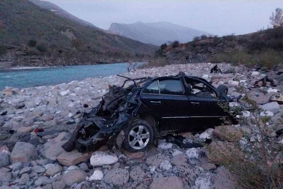A damaged vehicle that crashed into the Vjosa River about 150 miles south east of the capital, Tirana (Albanian Police via AP)