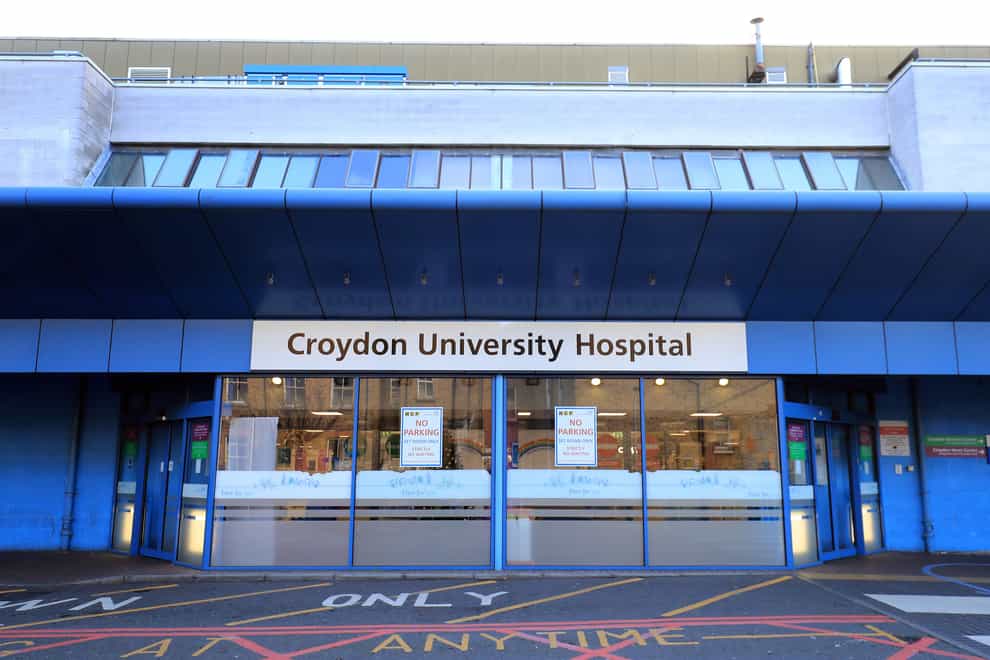 The woman was taken to Croydon University Hospital on Thursday (Gareth Fuller/PA)