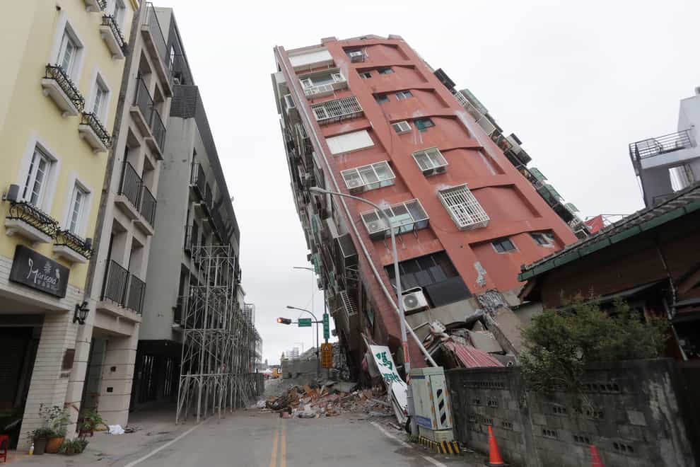 A partially collapsed, building, two days after a powerful earthquake struck Hualien, eastern Taiwan (Chiang Ying-ying/AP)
