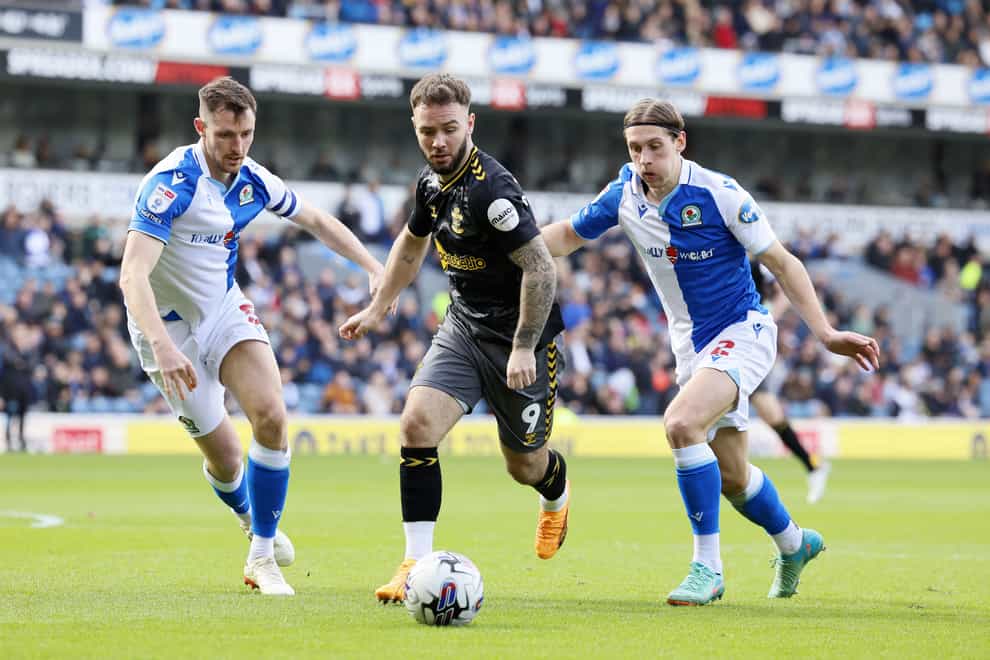 Adam Armstrong, centre, keeps hold of the ball (Richard Sellers/PA)