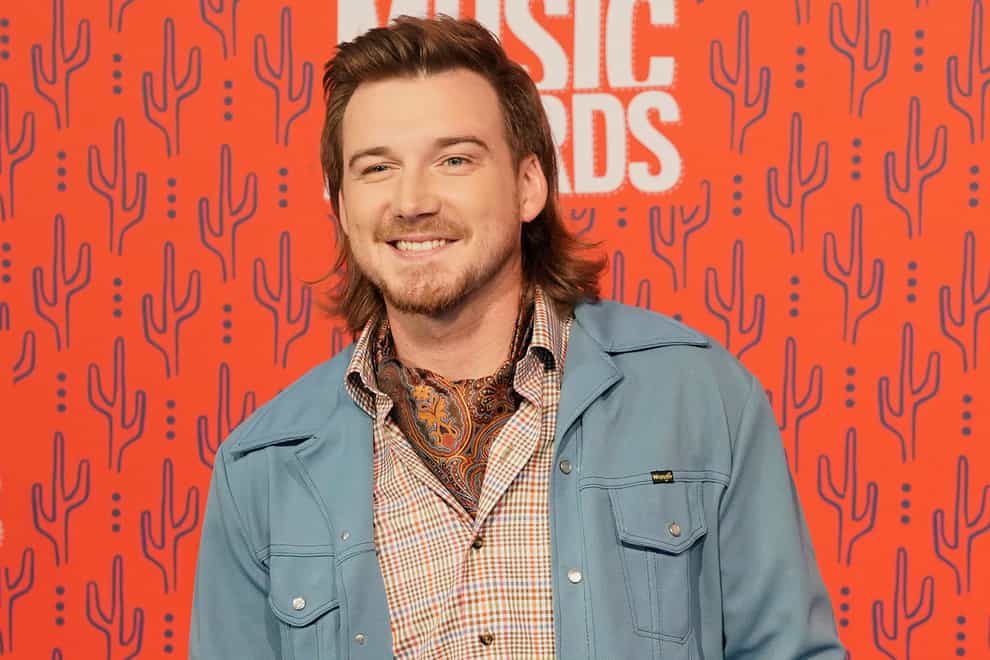FILE – In this June 5, 2019, file photo, Morgan Wallen arrives at the CMT Music Awards on at the Bridgestone Arena in Nashville, Tenn. Wallen has been arrested after police say he threw a chair off the rooftop of a newly opened six-story bar in downtown Nashville. Wallen, 30, was booked into jail early Monday, April 8, 2024 on three felony counts of reckless endangerment and one misdemeanor count of disorderly conduct, Metro Nashville Police tweeted. (AP Photo/Sanford Myers, File)