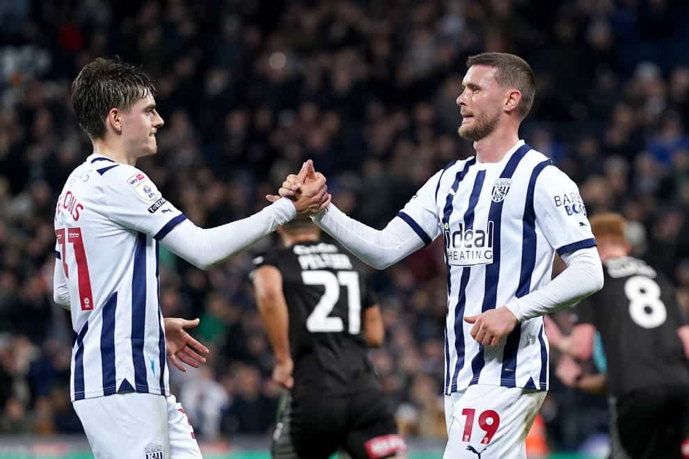 John Swift (right) celebrates after scoring West Brom’s second (Bradley Collyer/PA)