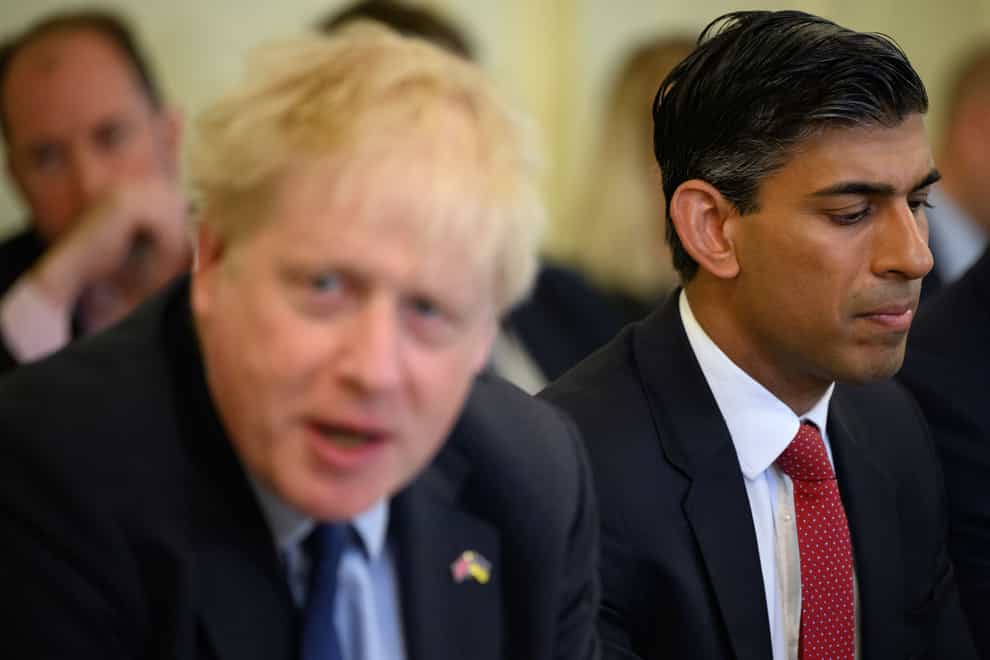 Rishi Sunak and then prime minister Boris Johnson at a cabinet meeting (Leon Neal/PA)