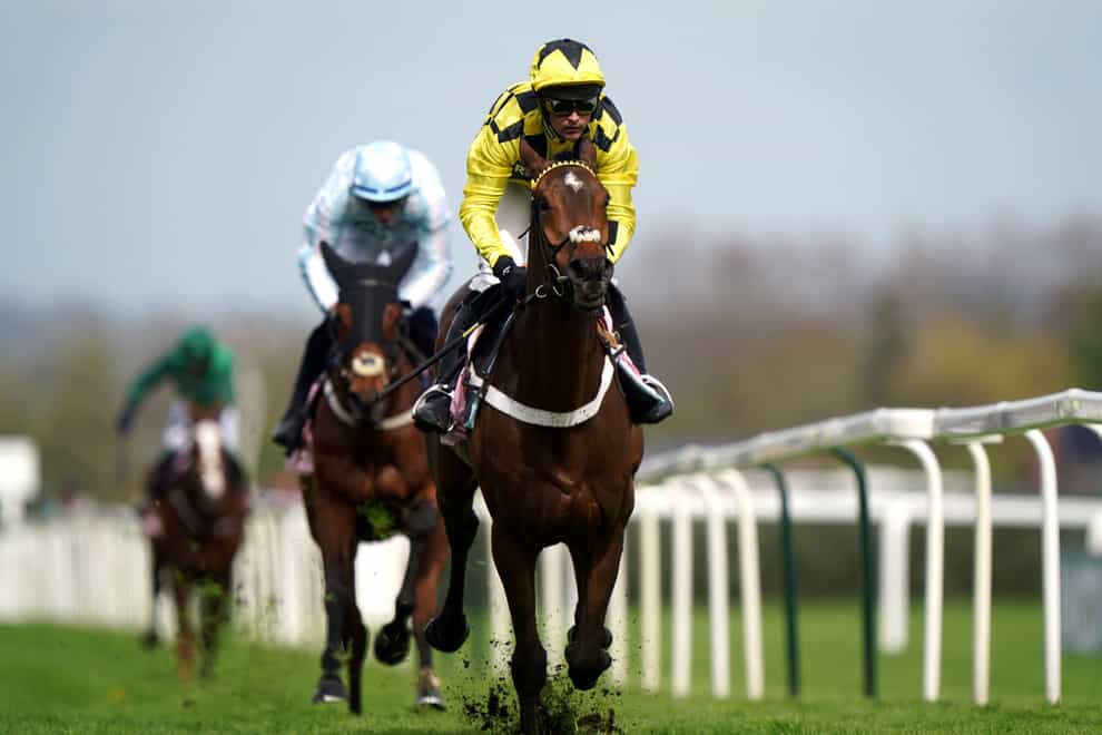 Sir Gino ridden by Nico de Boinville on their way to winning at Aintree (Bradley Collyer/PA)