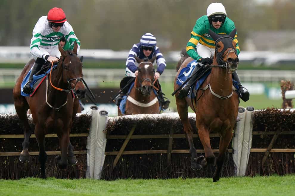 Mystical Power (right) was too strong for Firefox at Aintree (Bradley Collyer/PA)