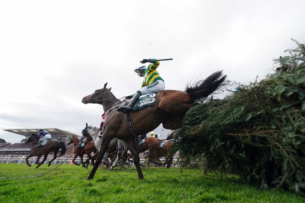 I Am Maximus ridden by Paul Townend, jumps the Chair, on their way to winning the Randox Grand National Handicap Chase (Mike Egerton/PA)