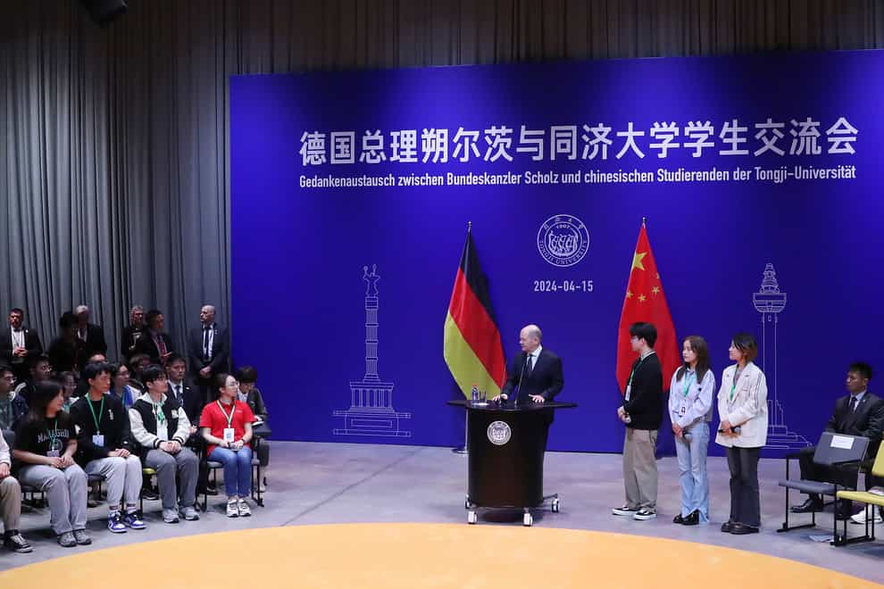 German Chancellor Olaf Scholz talks to students at Tongji University’s Jiading Campus in Shanghai, China (Fang Zhe/Xinhua via AP)