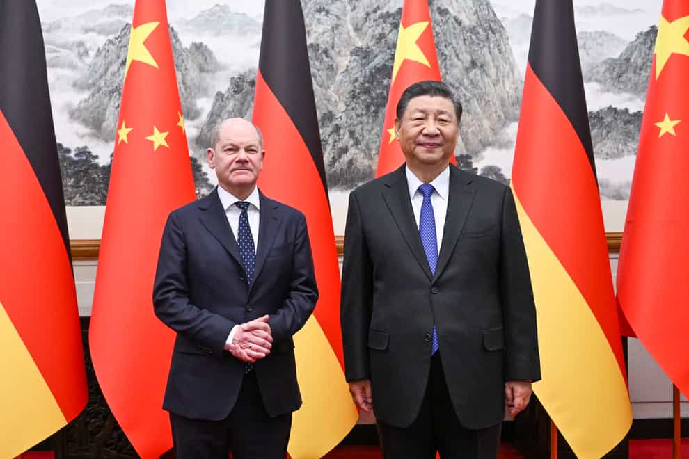 German Chancellor Olaf Scholz and Chinese President Xi Jinping at the Diaoyutai State Guesthouse in Beijing, China (Xie Huanchi/Xinhua via AP)
