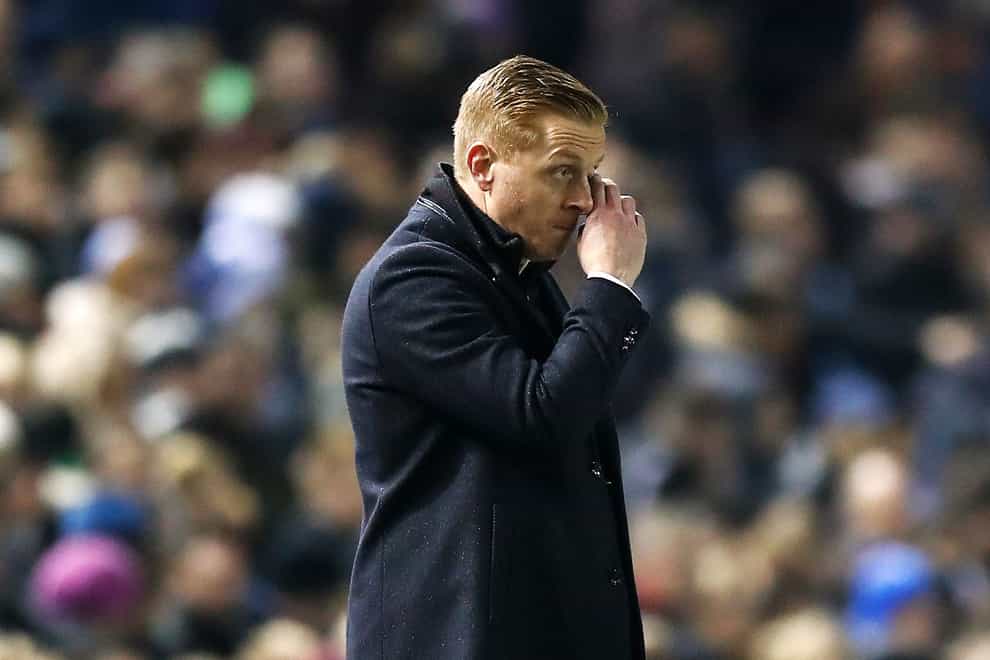 Garry Monk’s Cambridge suffered a late defeat at Bristol Rovers (Martin Rickett/PA)