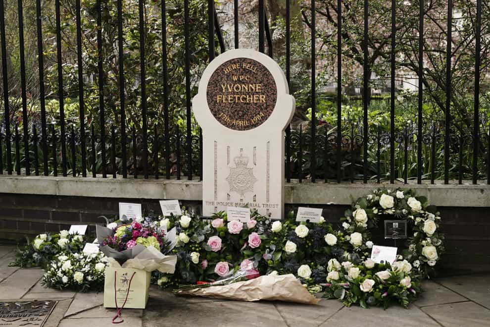 Wreaths and tribute sleft at the memorial stone for Pc Yvonne Fletcher (Jordan Pettitt/PA)