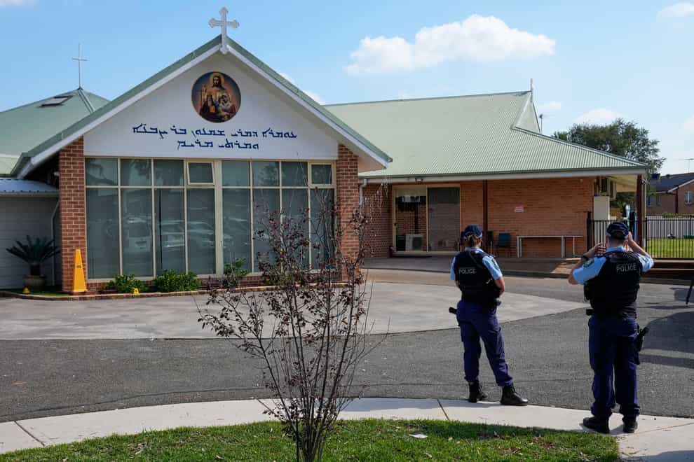 A Muslim community leader said the father of a boy accused of stabbing two Christian clerics in Australia saw no signs of his son’s extremism (Mark Baker/AP)