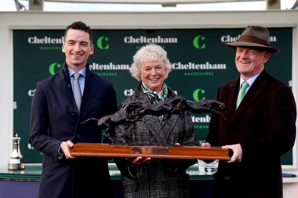 Patrick Mullins (left) with his mum, Jackie and father, Willie (David Davies/PA)