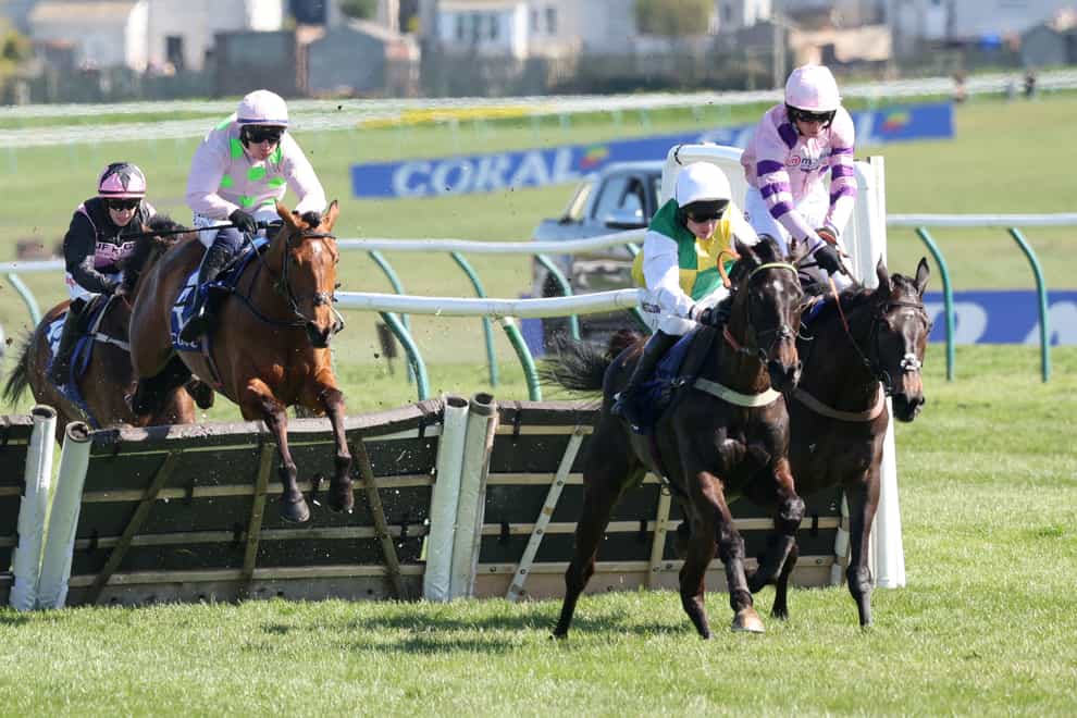 Favour And Fortune (second right) ridden by jockey Tom Cannon on their way to winning the Coral Scottish Champion Hurdle during the Coral Scottish Grand National festival at Ayr Racecourse. Picture date: Saturday April 20, 2024.