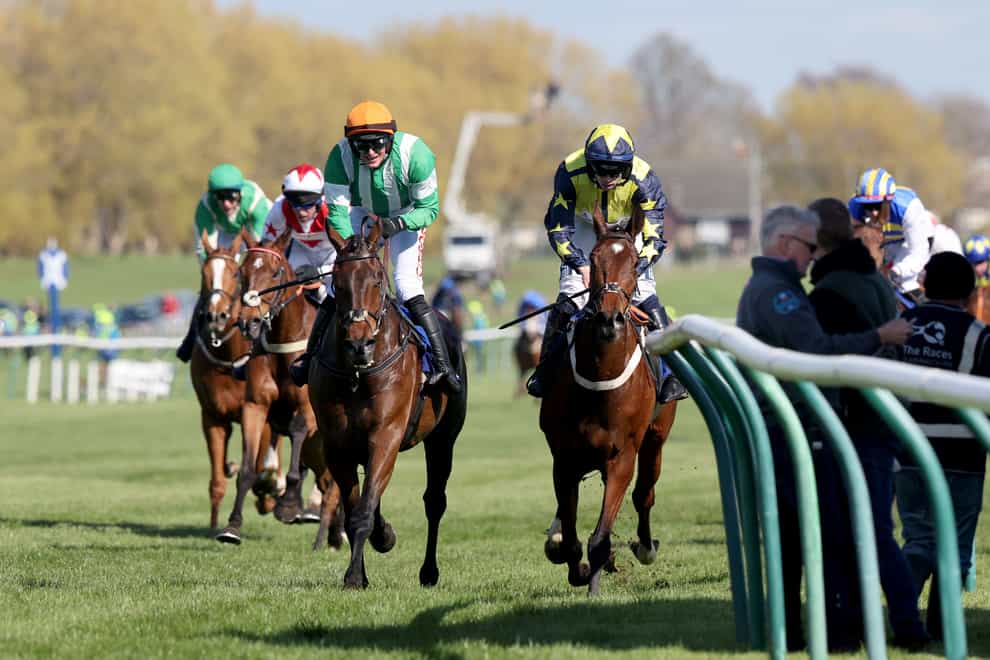 Surrey Quest (right) finished a narrow second in the Scottish Grand National (Robert Perry/PA)