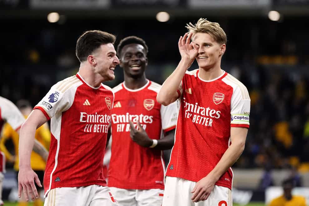 Arsenal’s Martin Odegaard celebrates his goal at Wolves (Nick Potts/PA)