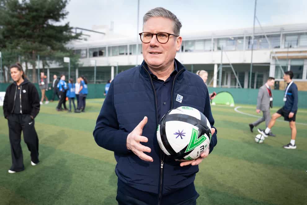 Football fan Sir Keir Starmer said too many children do not have the chance to take part in team sports (Stefan Rousseau/PA)