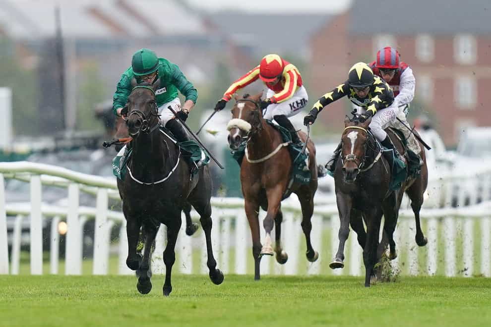 Relief Rally ridden by jockey Tom Marquand (left) winning the Weatherbys Super Sprint Stakes (Adam Davy/PA)