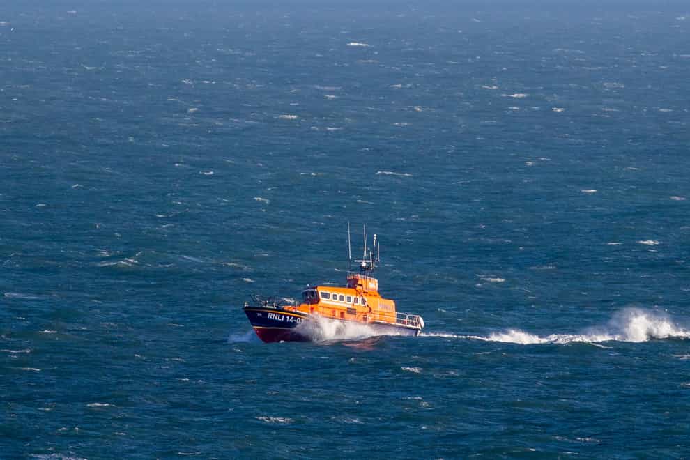 The Coastguard was called and rescued three men (File photo/Steve Parsons/PA)
